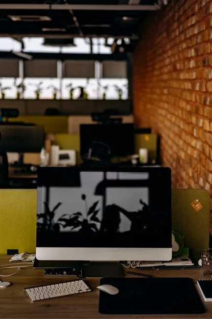 A person using a laptop to browse stock photo websites. Freelancing work in a cozy setting.