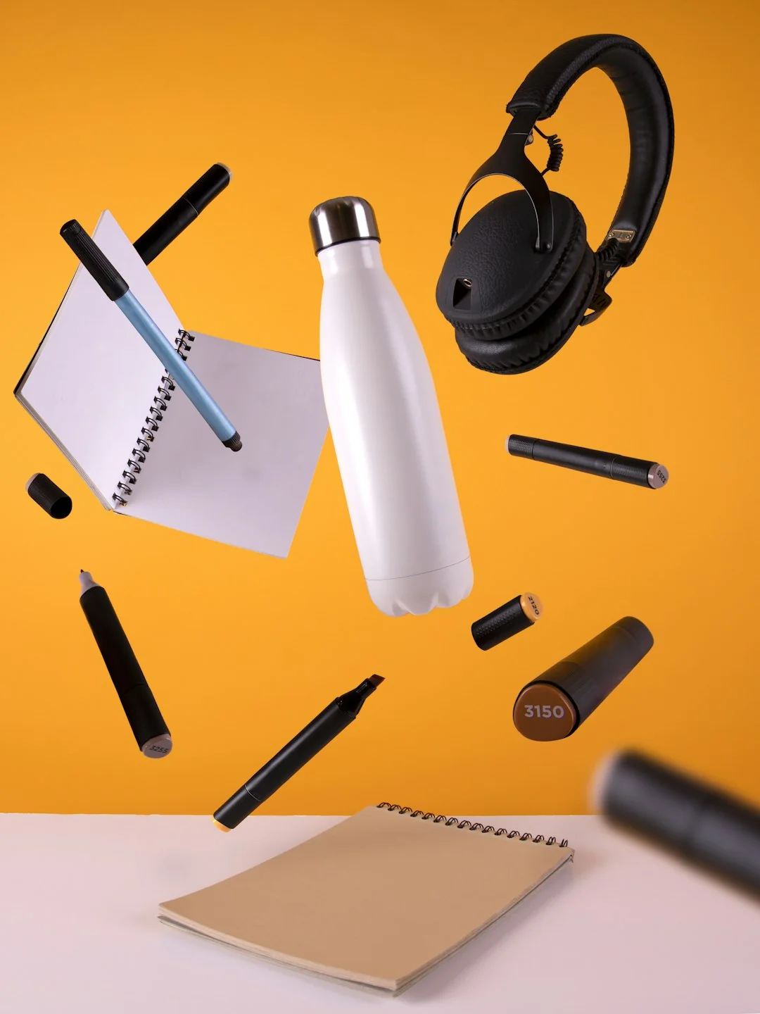 A modern computer screen displaying web design work, showcasing creative visuals in a workspace.
